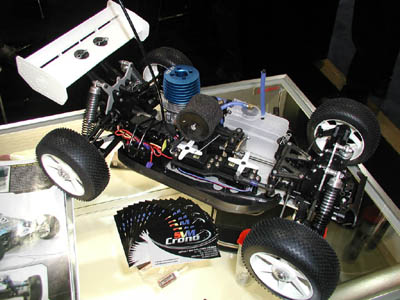 The RS01 1/8th-scale buggy from SVM Crono.  Available in either kit form or as a ready-to-run, the RS01 is powered by a Crono RS3 .21-sized engine made by Novarossi, boasting 2.40HP.  With close attention paid to the race-worthiness of the buggy, there is no doubt that the RS01 will be competitive right out of the box, even as an RTR. (Click to enlarge)