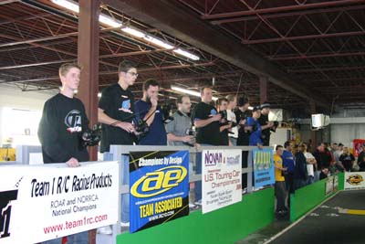 Drivers from the Stock Foam A-Main on the stand just before a race. (Click to enlarge)