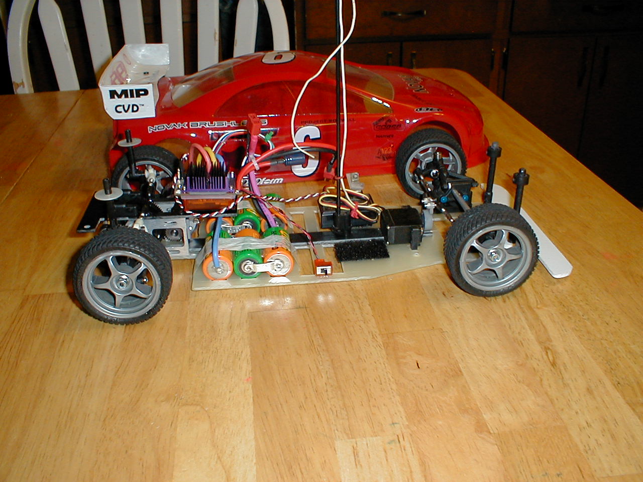 Why the non-independent rear suspension on 2-WD RC Cars.