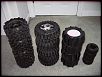 FOR SALE: ProLine paddle tires mounted to Ofna white dish rims.-tiretowers.jpg