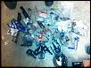 2 Traxxas Revo 3.3 w/ plenty parts and upgrades-photo-4.jpg