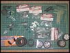 12L4 with mini servo, extra sets of foam tires, and misc parts-parts12l4.jpg